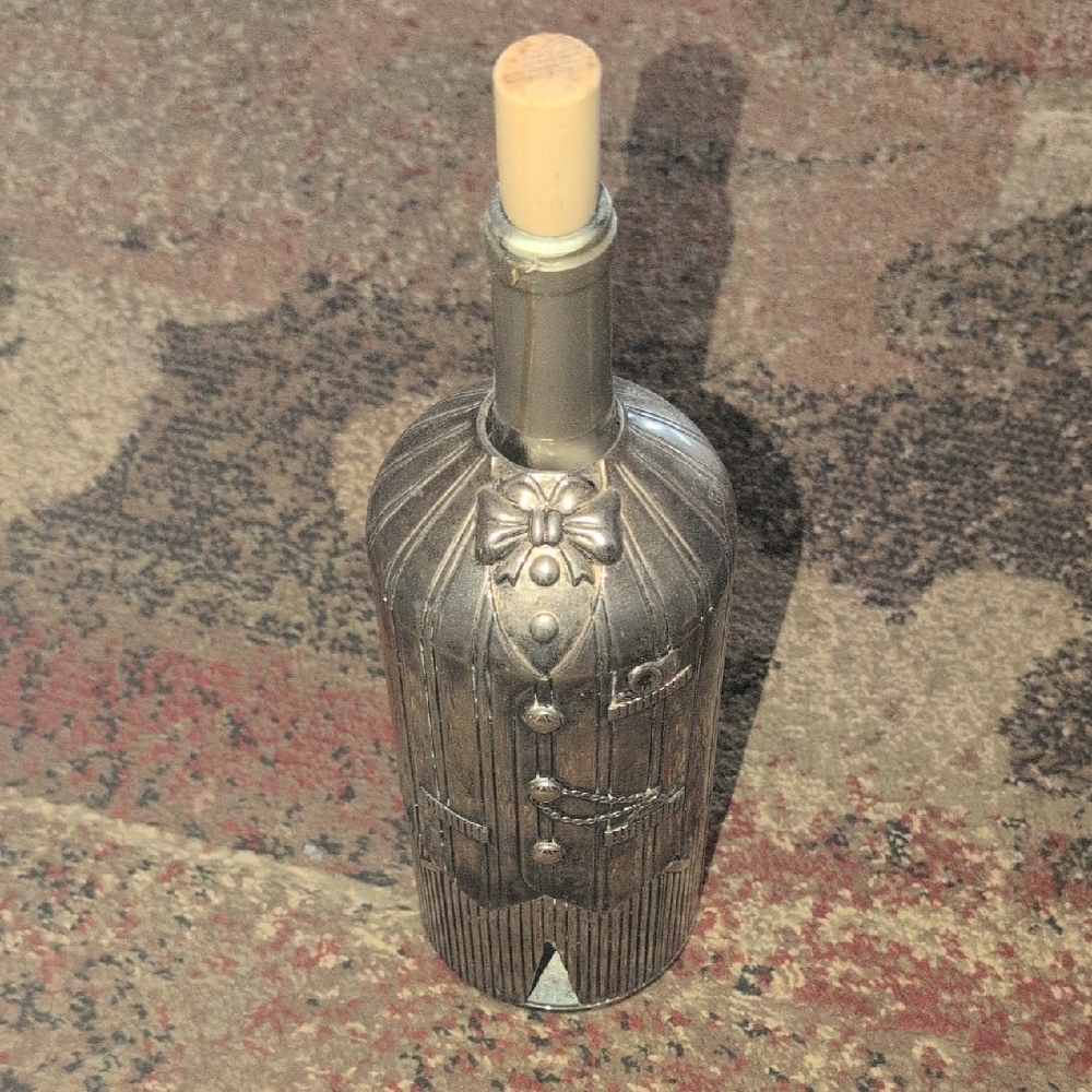 Vintage Decorative Bottle cover with Tuxedo Design. Made by Godinger